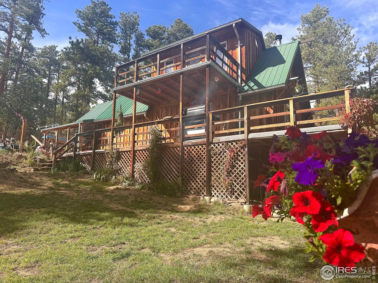 147 Cedar Drive Lyons, CO 80540 - Photo 4 of 37 Exterior rain water collection for outdoor watering of all your plants in your garden!