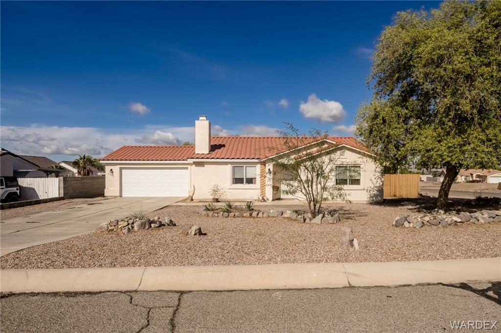 2333 Primavera Loop Fort Mohave, AZ 86426 - Photo 3 of 57 front view of a house with a road