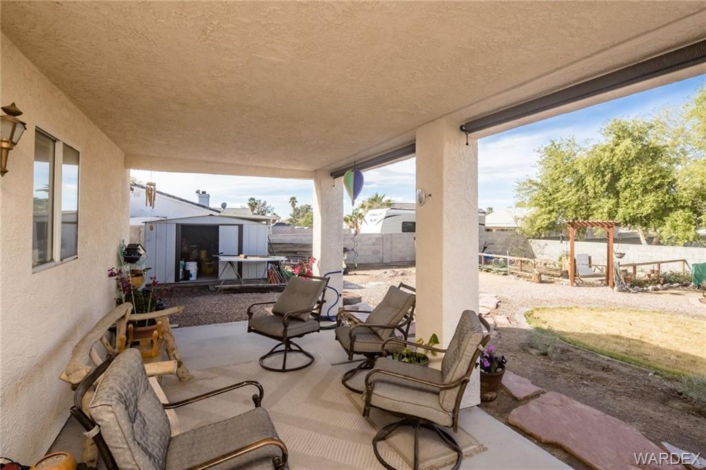 2333 Primavera Loop Fort Mohave, AZ 86426 - Photo 33 of 57 a living room with furniture and a large window
