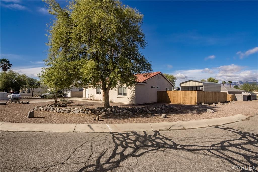 2333 Primavera Loop Fort Mohave, AZ 86426 - Photo 4 of 57 a view of a house with snow on the road