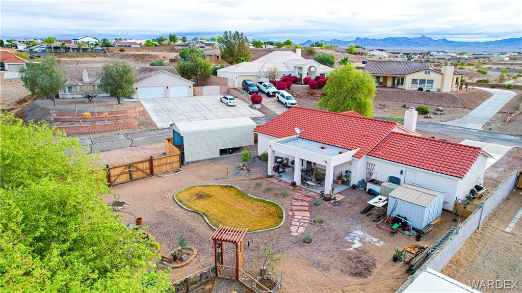 2333 Primavera Loop Fort Mohave, AZ 86426 - Photo 50 of 57 an aerial view of a house with swimming pool and mountains