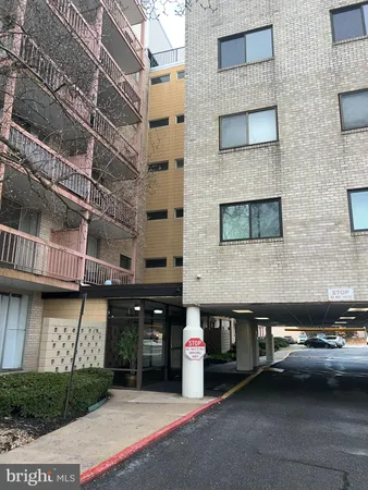 a view of a car park in front of building