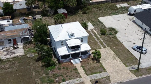 a view of a backyard of a house