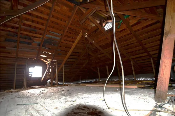 a view of a dinning room with a wooden fence
