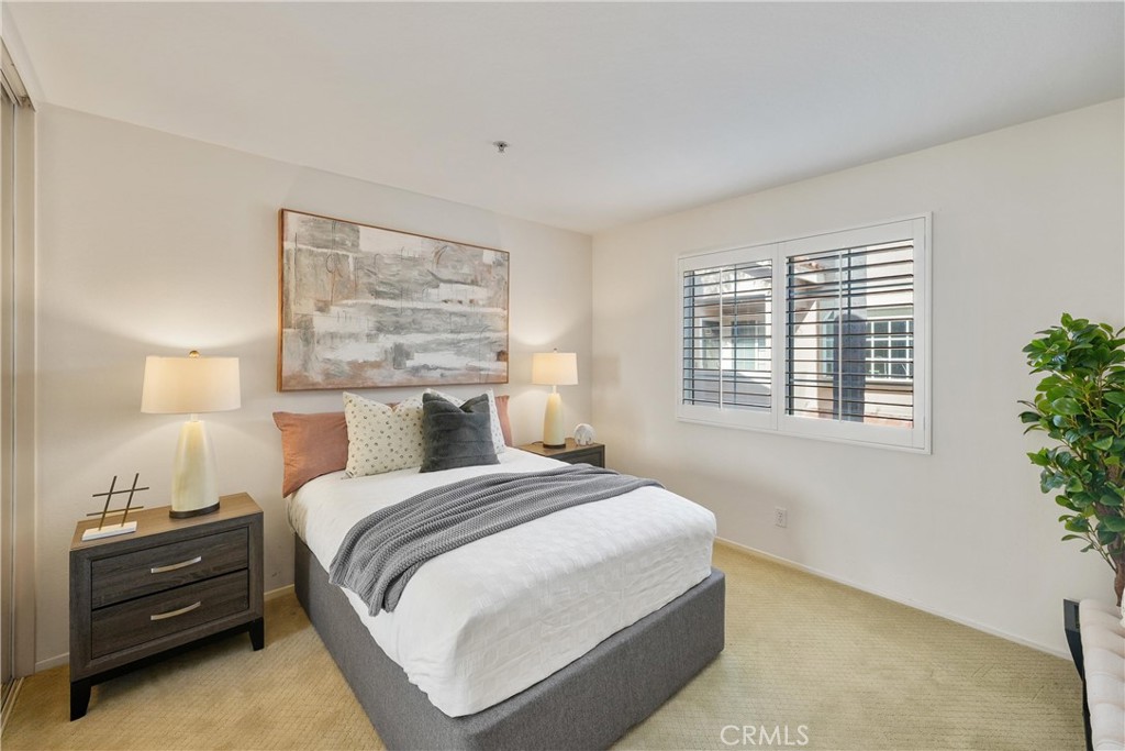 2325 Dunes Tustin, CA 92782 - Photo 11 of 25 a bedroom with a bed and a window