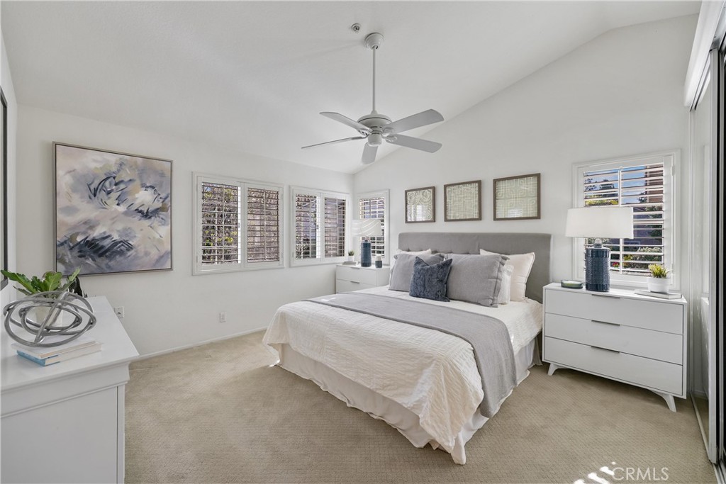 2325 Dunes Tustin, CA 92782 - Photo 14 of 25 a bedroom with a large bed and a window