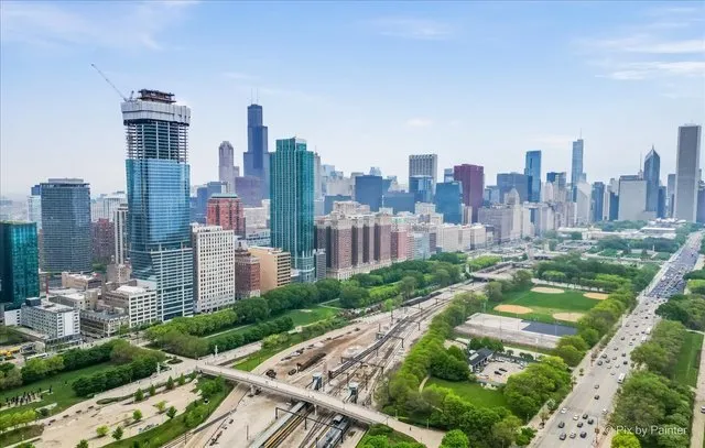 a view of a city with tall buildings