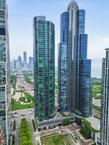 a view of a city with tall buildings