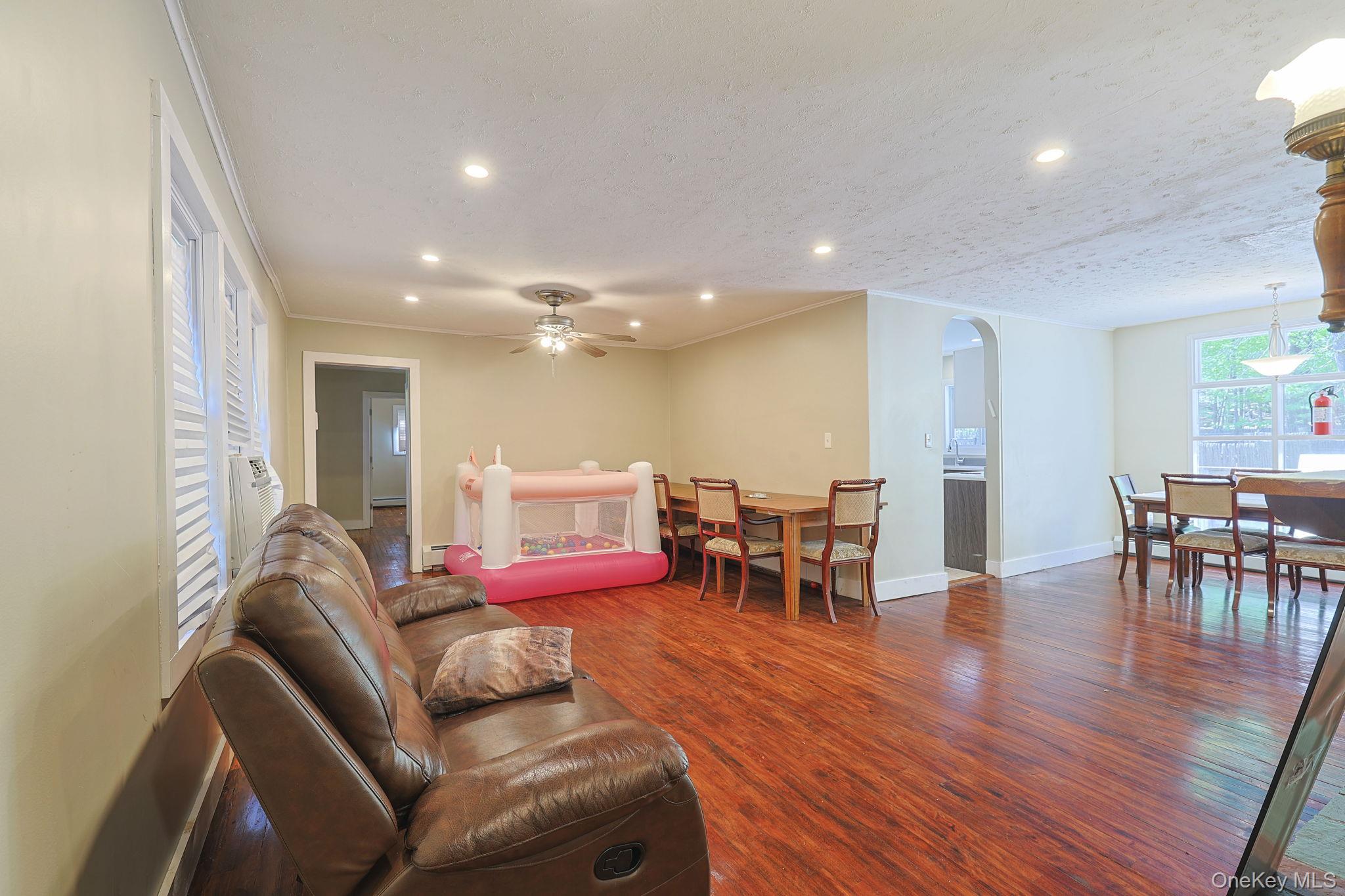 30 Rock Ridge Avenue Monticello, NY 12701 - Photo 7 of 19 a living room with furniture and wooden floor