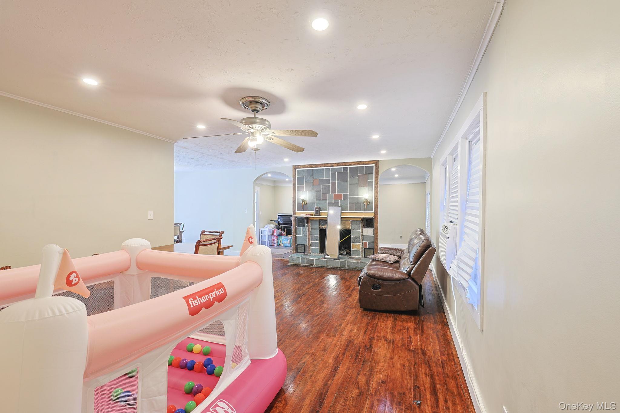 30 Rock Ridge Avenue Monticello, NY 12701 - Photo 10 of 19 a living room with furniture and wooden floor