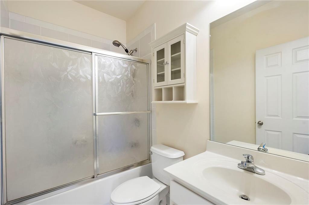 804 Morganton Drive Suwanee, GA 30024 - Photo 15 of 43 a bathroom with a sink toilet and shower
