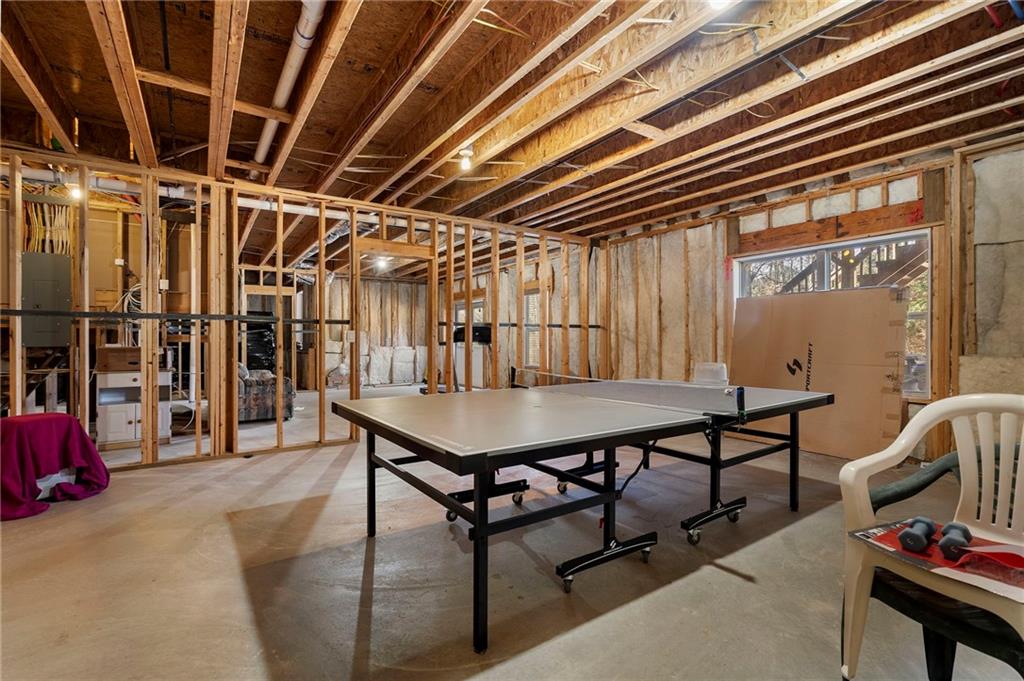 804 Morganton Drive Suwanee, GA 30024 - Photo 17 of 43 a view of a room with gym equipment