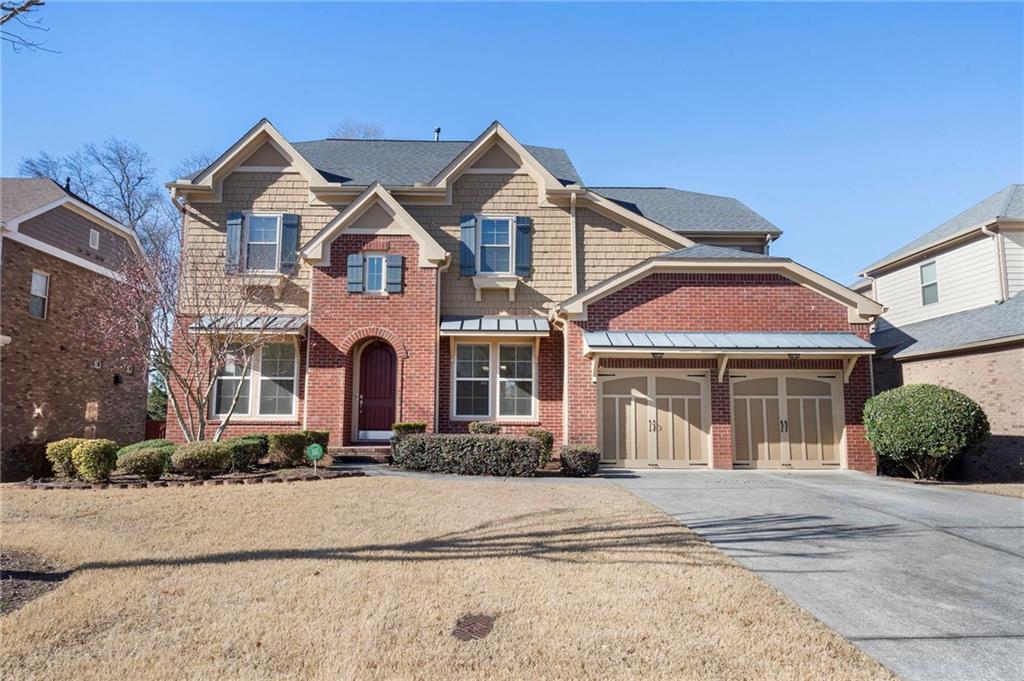 804 Morganton Drive Suwanee, GA 30024 - Photo 2 of 43 front view of a house with a yard