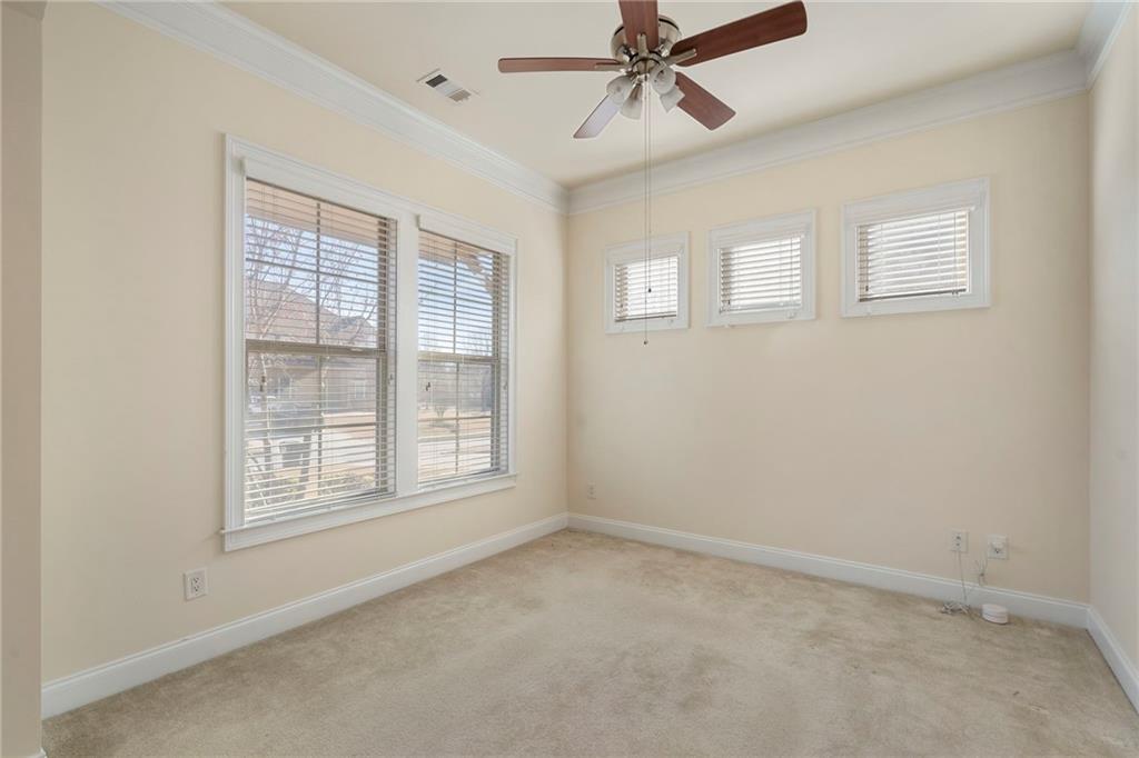 804 Morganton Drive Suwanee, GA 30024 - Photo 22 of 43 a view of an empty room with a window