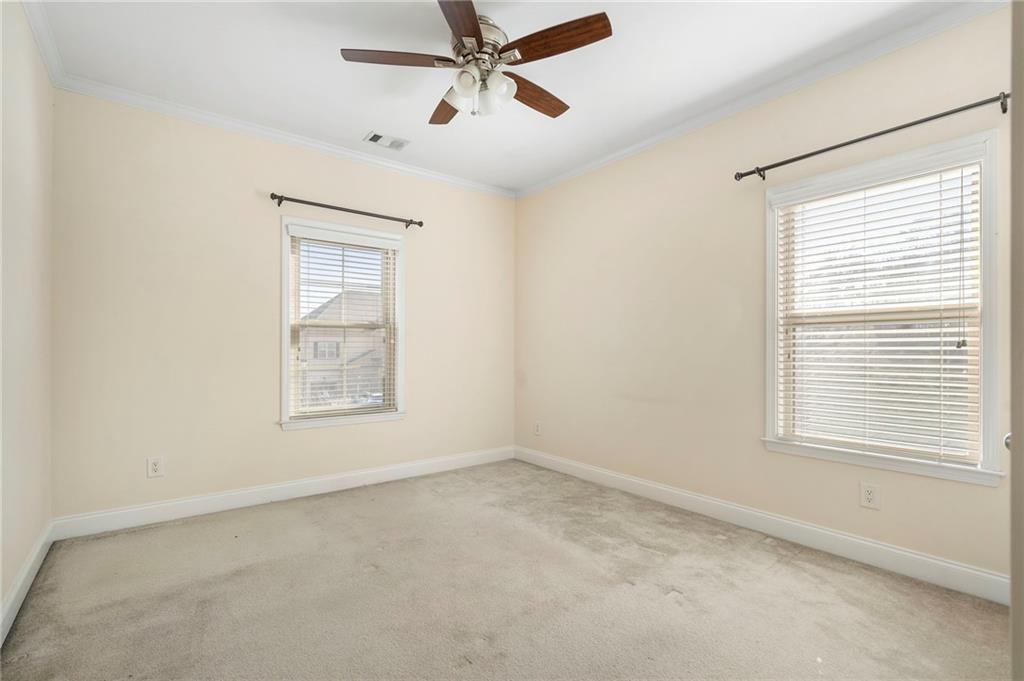804 Morganton Drive Suwanee, GA 30024 - Photo 34 of 43 a view of an empty room with a window