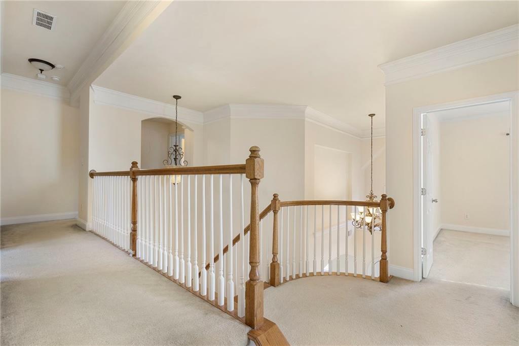 804 Morganton Drive Suwanee, GA 30024 - Photo 37 of 43 a view of a hallway view with staircase