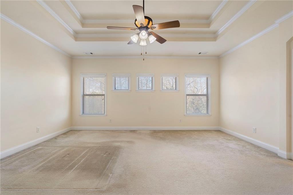 804 Morganton Drive Suwanee, GA 30024 - Photo 38 of 43 wooden floor in an empty room with a window