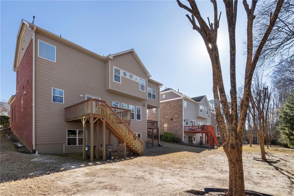 804 Morganton Drive Suwanee, GA 30024 - Photo 4 of 43 a view of a house with a yard