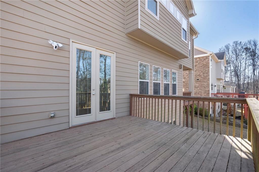804 Morganton Drive Suwanee, GA 30024 - Photo 6 of 43 a view of a wooden deck