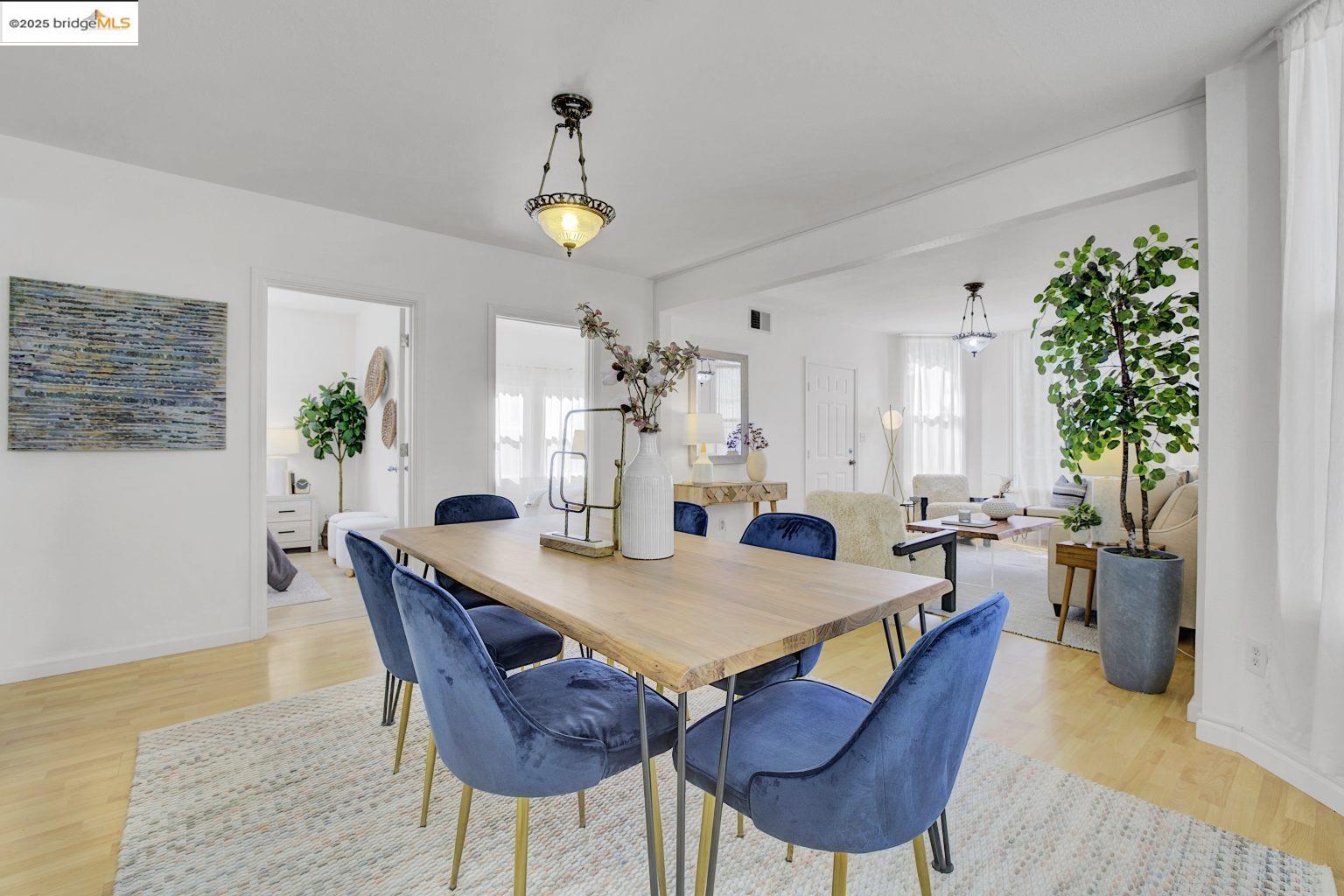 3830 Clarke Street Oakland, CA 94609 - Photo 11 of 41 a view of a dining room with furniture and window