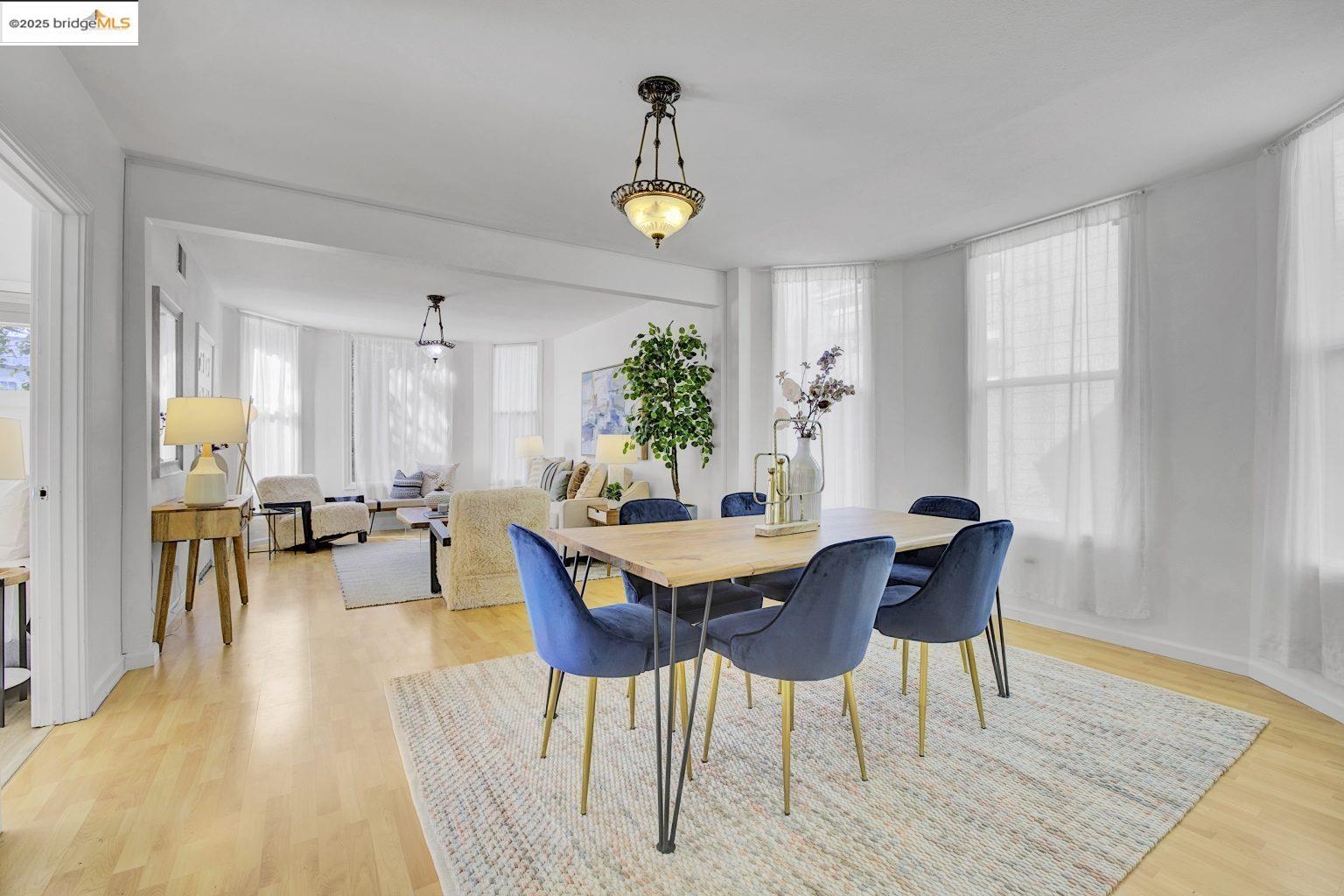 3830 Clarke Street Oakland, CA 94609 - Photo 12 of 41 a view of a a dining room with furniture window and wooden floor