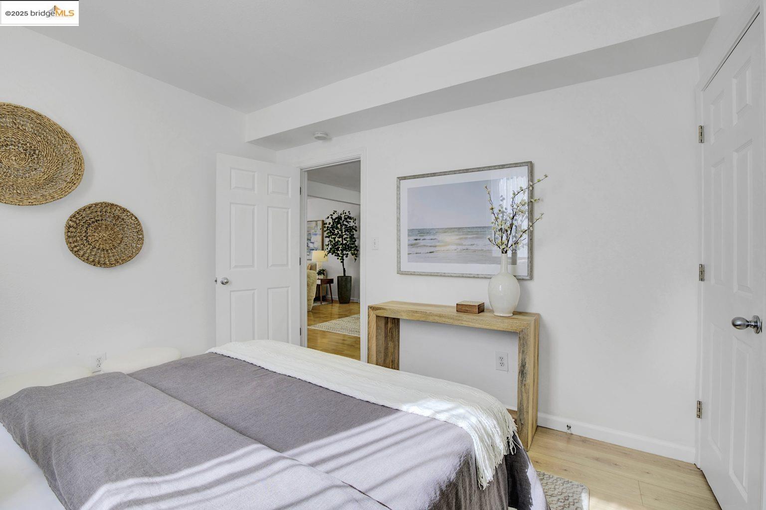 3830 Clarke Street Oakland, CA 94609 - Photo 18 of 41 a bedroom with a bed and a window