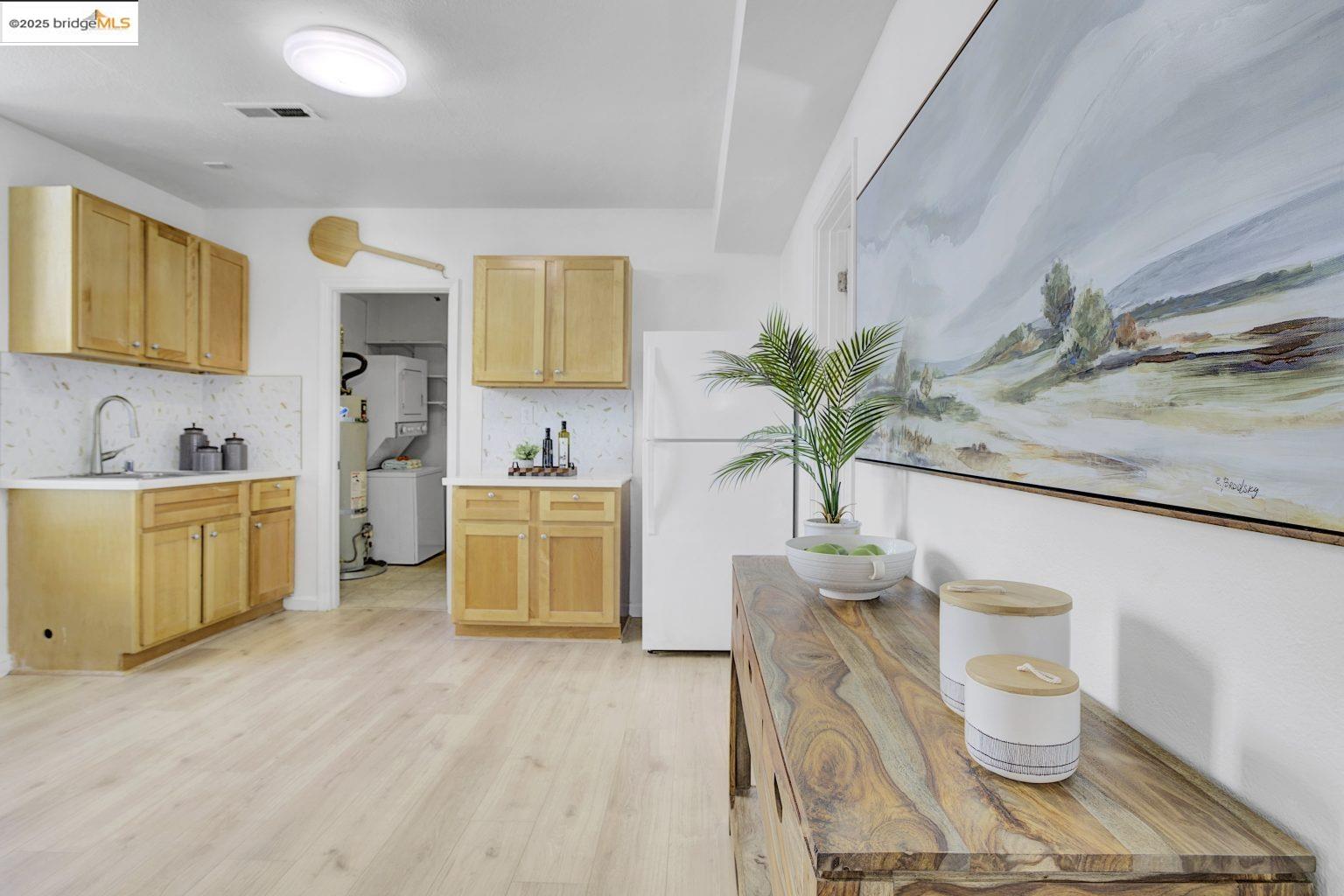 3830 Clarke Street Oakland, CA 94609 - Photo 20 of 41 a room with a sink and a mirror