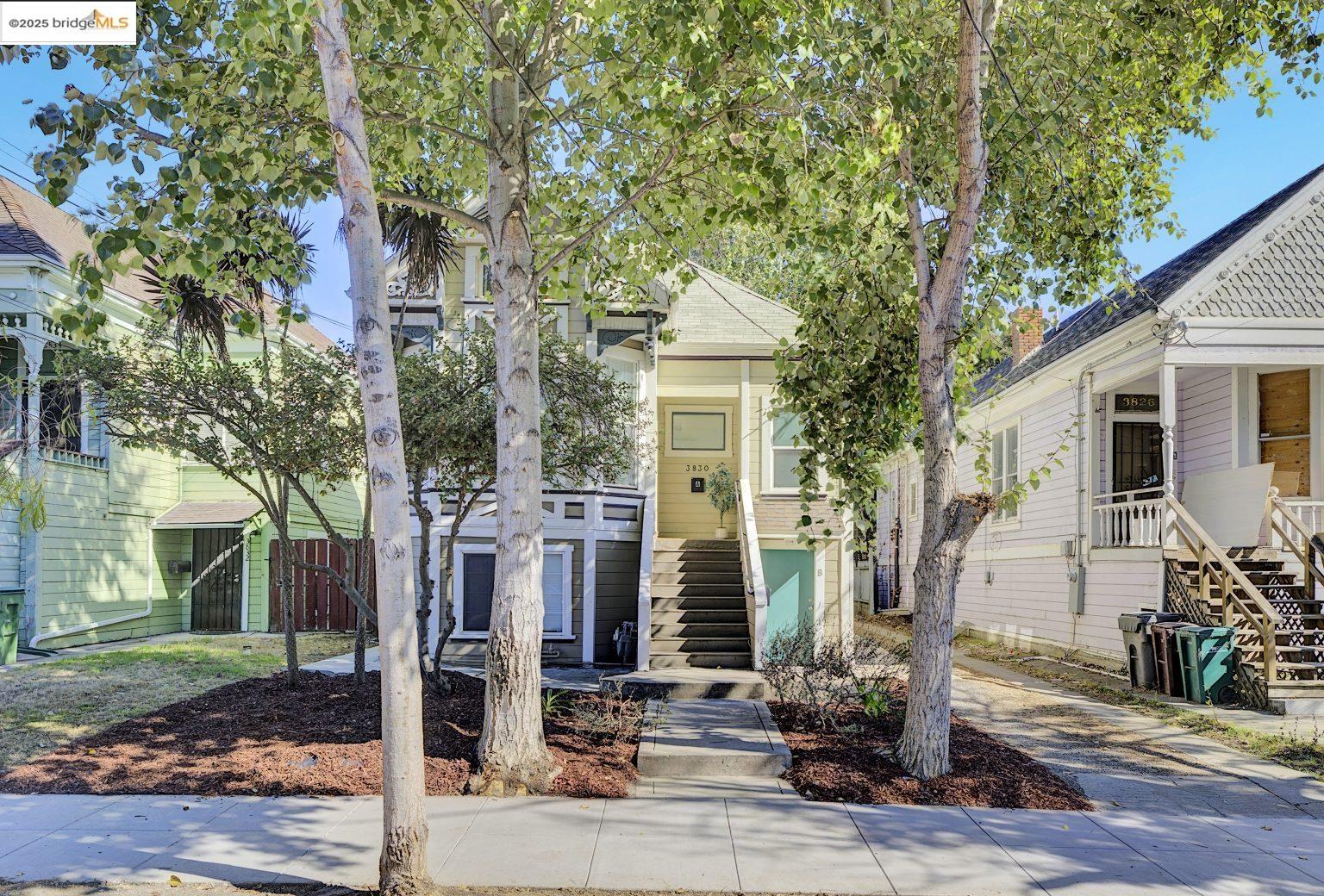 3830 Clarke Street Oakland, CA 94609 - Photo 35 of 41 a front view of a house with tree s