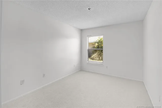 a bathroom with a shower and toilet