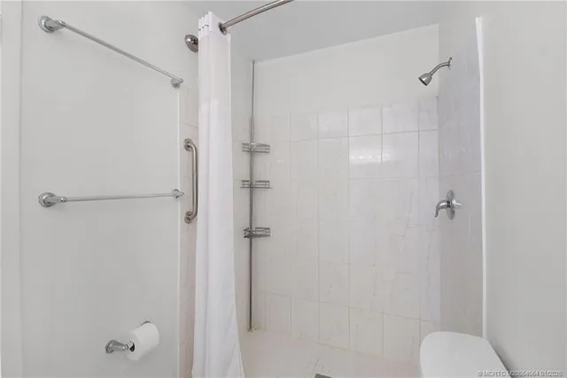 a view of a park with swings and slides