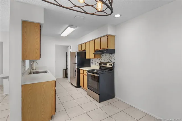 a view of kitchen with windows
