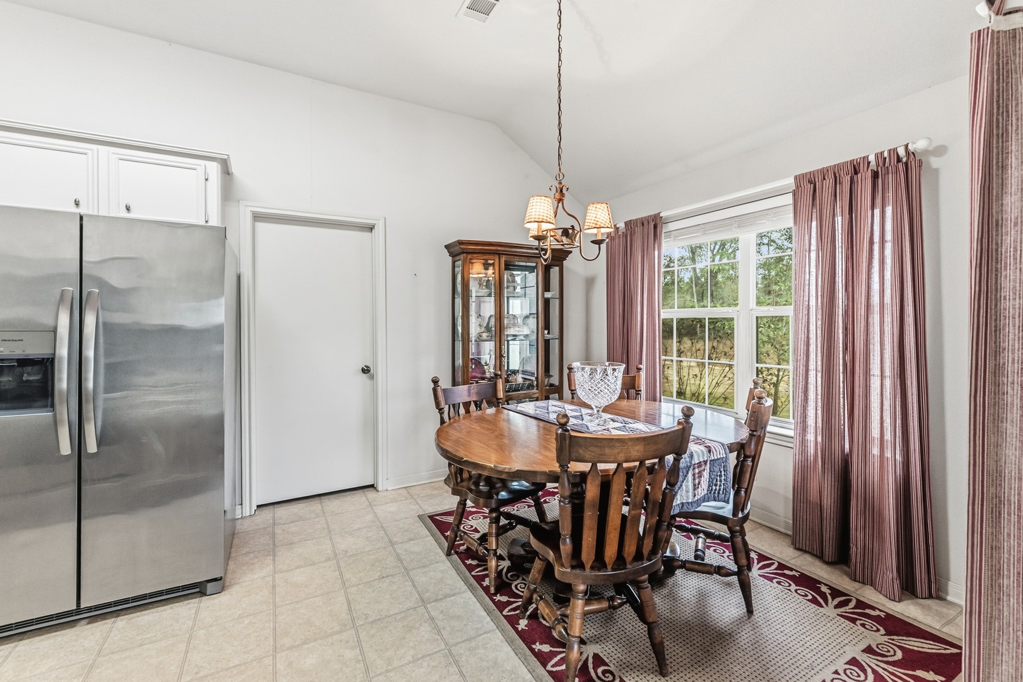 691 Bishop Road Huntsville, TX 77320 - Photo 12 of 32 a dining room with furniture window wooden floor