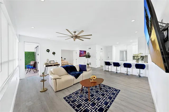 a kitchen that has a sink and a stove in it