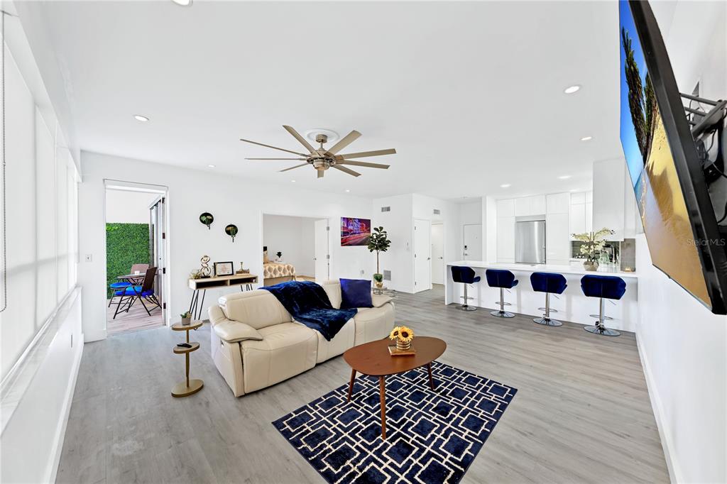 11 Island Avenue, Unit 309 Miami Beach, FL 33139 - Photo 13 of 28 a living room with furniture and a rug