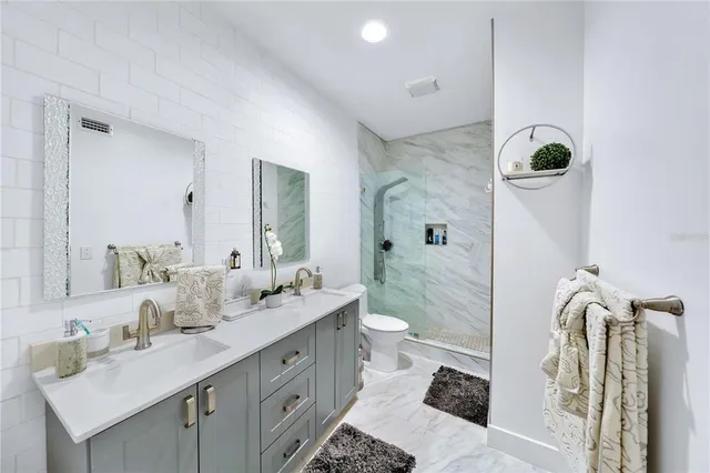 a view of a city with tall buildings