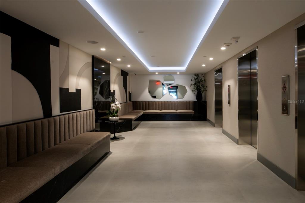 11 Island Avenue, Unit 309 Miami Beach, FL 33139 - Photo 3 of 28 a lobby with furniture and a rug