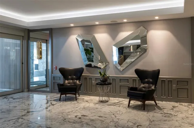 a kitchen with a wooden table and chairs