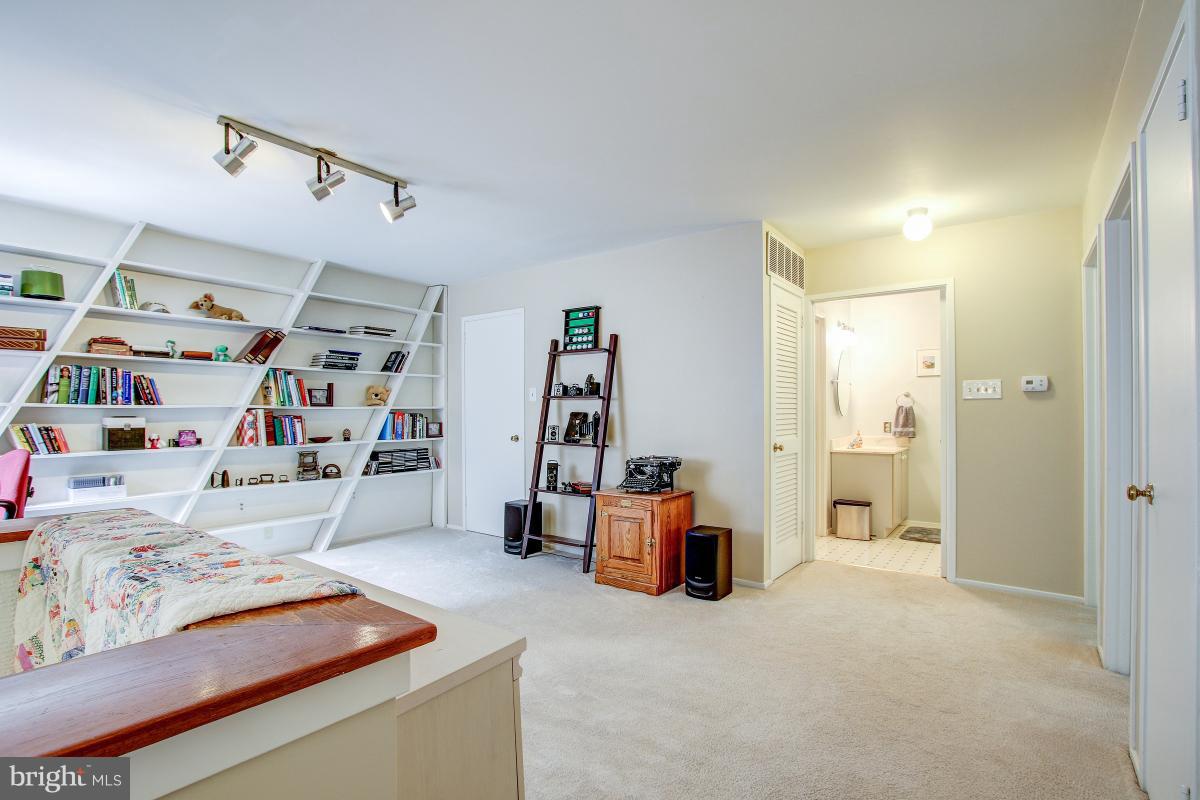 2367 Glade Bank Way Reston, VA 20191 - Photo 23 of 30 Awesome Loft on Upper Level with Built-In Shelving