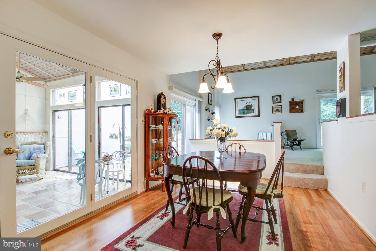 2367 Glade Bank Way Reston, VA 20191 - Photo 9 of 30 Dining Room opens to Sunroom