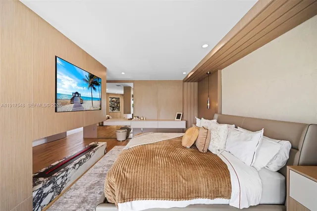 a bedroom with double bed and a large window