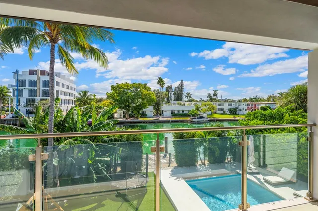 a view of a lake from a balcony