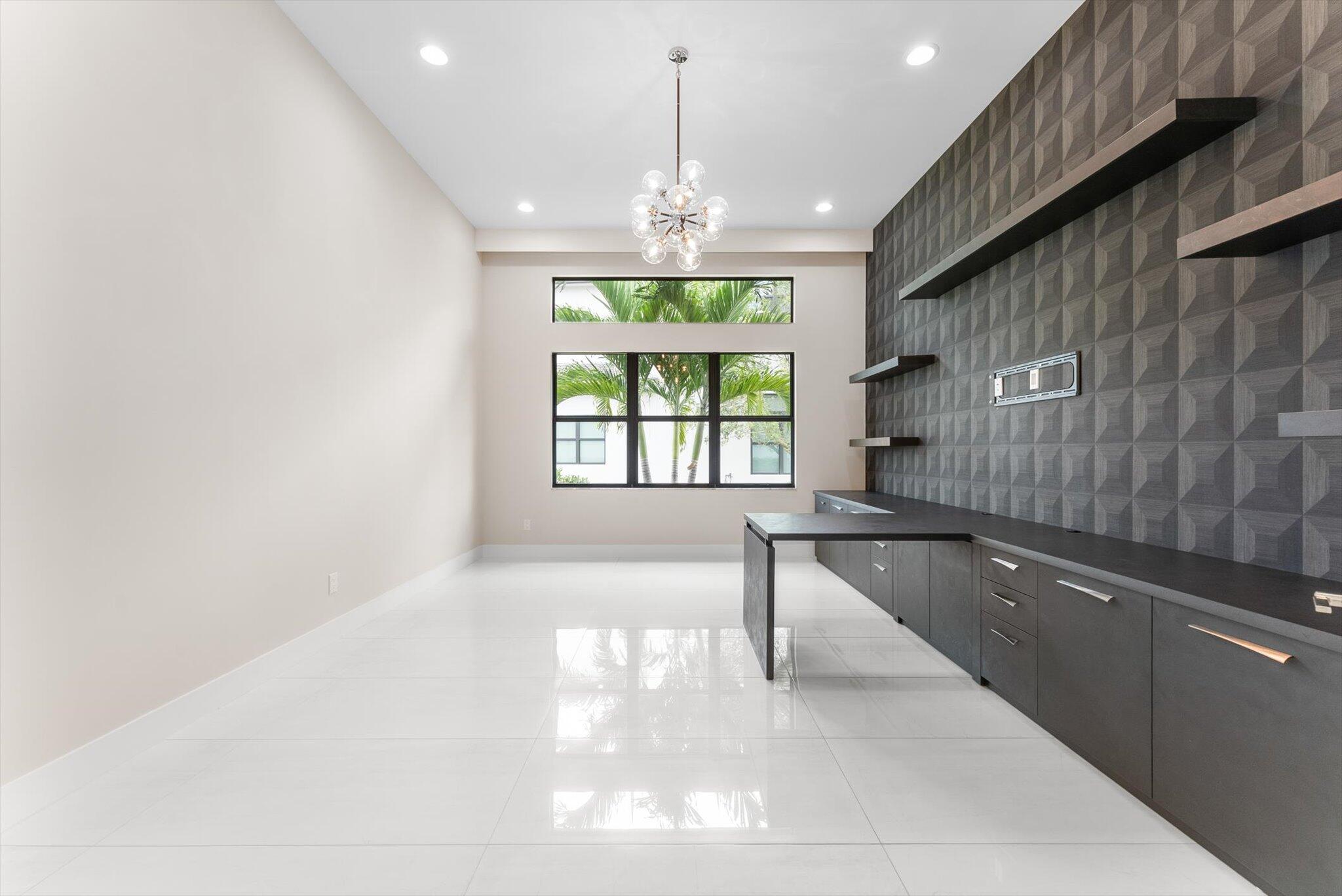 9794 Chianti Classico Terrace Boca Raton, FL 33496 - Photo 15 of 118 a large white kitchen with a large window