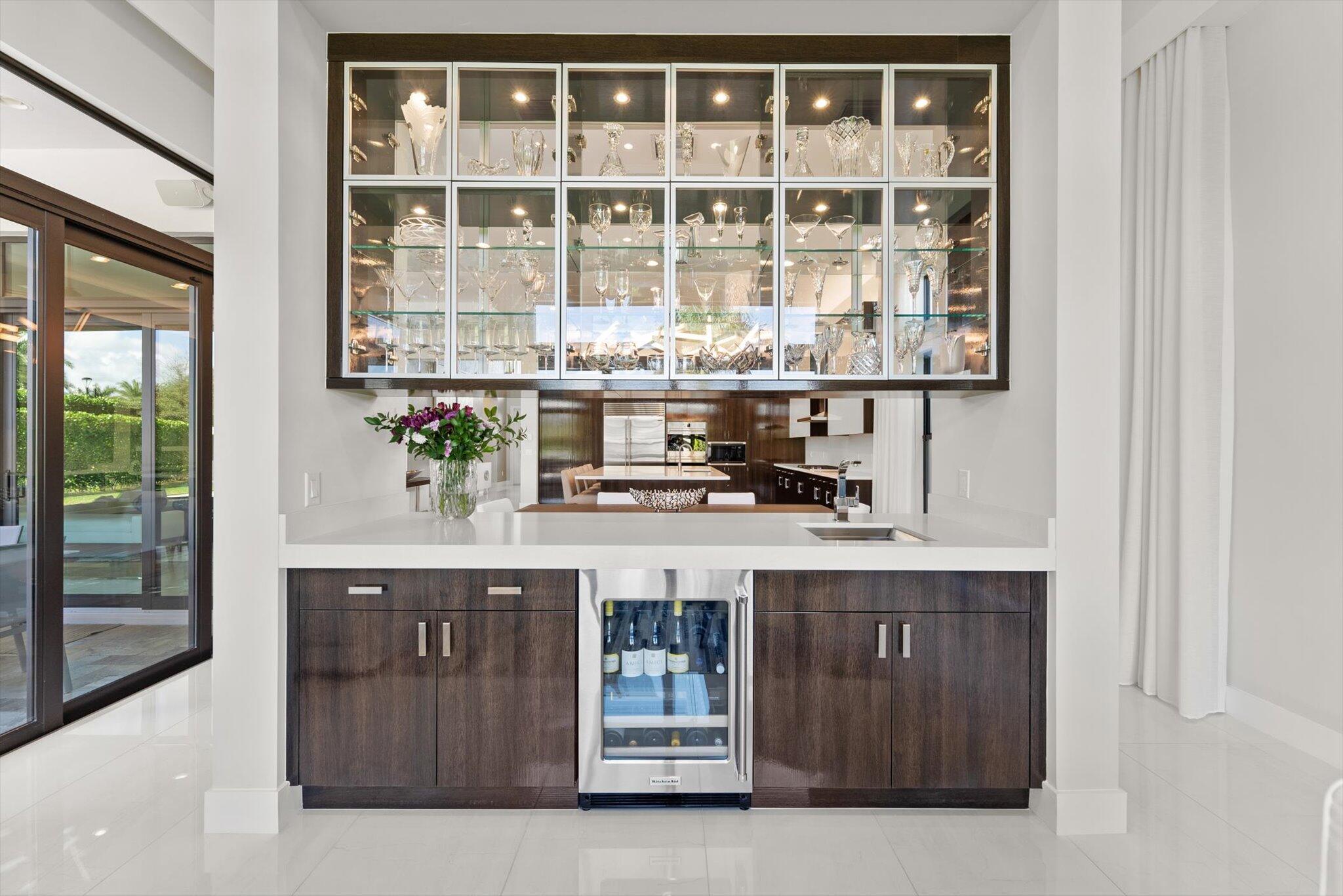 9794 Chianti Classico Terrace Boca Raton, FL 33496 - Photo 38 of 118 a kitchen with stainless steel appliances granite countertop a stove and a sink