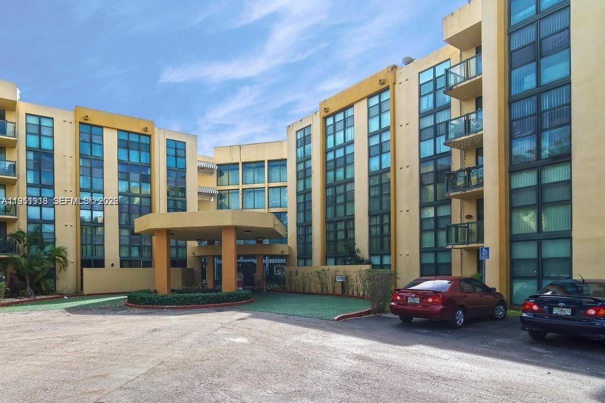 11750 Southwest 18th Street, Unit 1221 Miami, FL 33175 - Photo 6 of 6 a car parked in front of a building