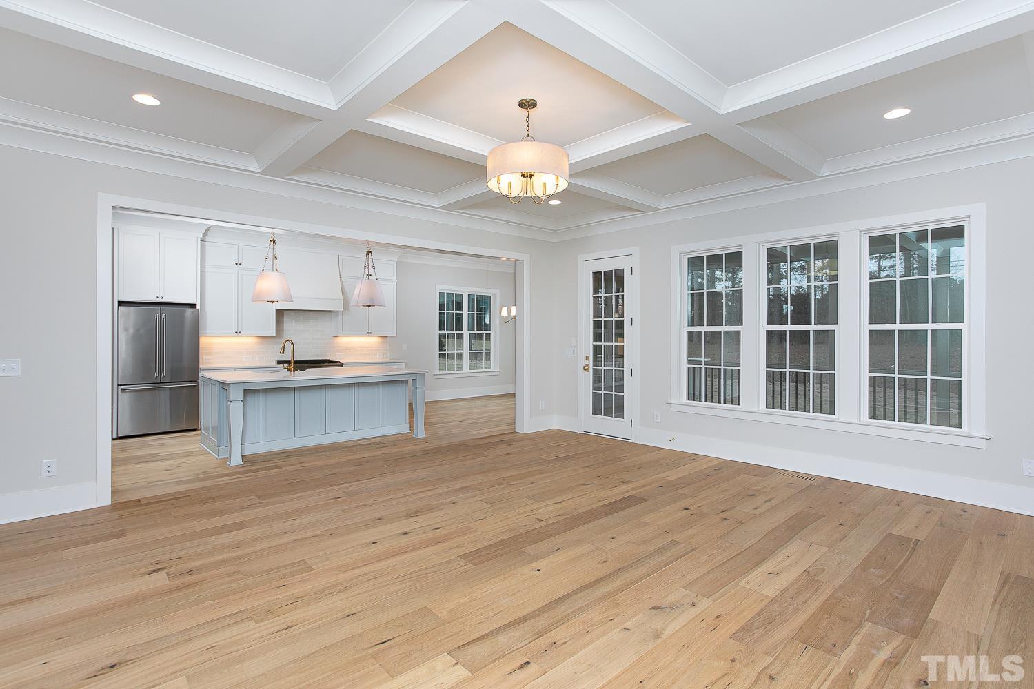 1429 Starry Night Court Raleigh, NC 27613 - Photo 8 of 31 a view of an empty room with a kitchen