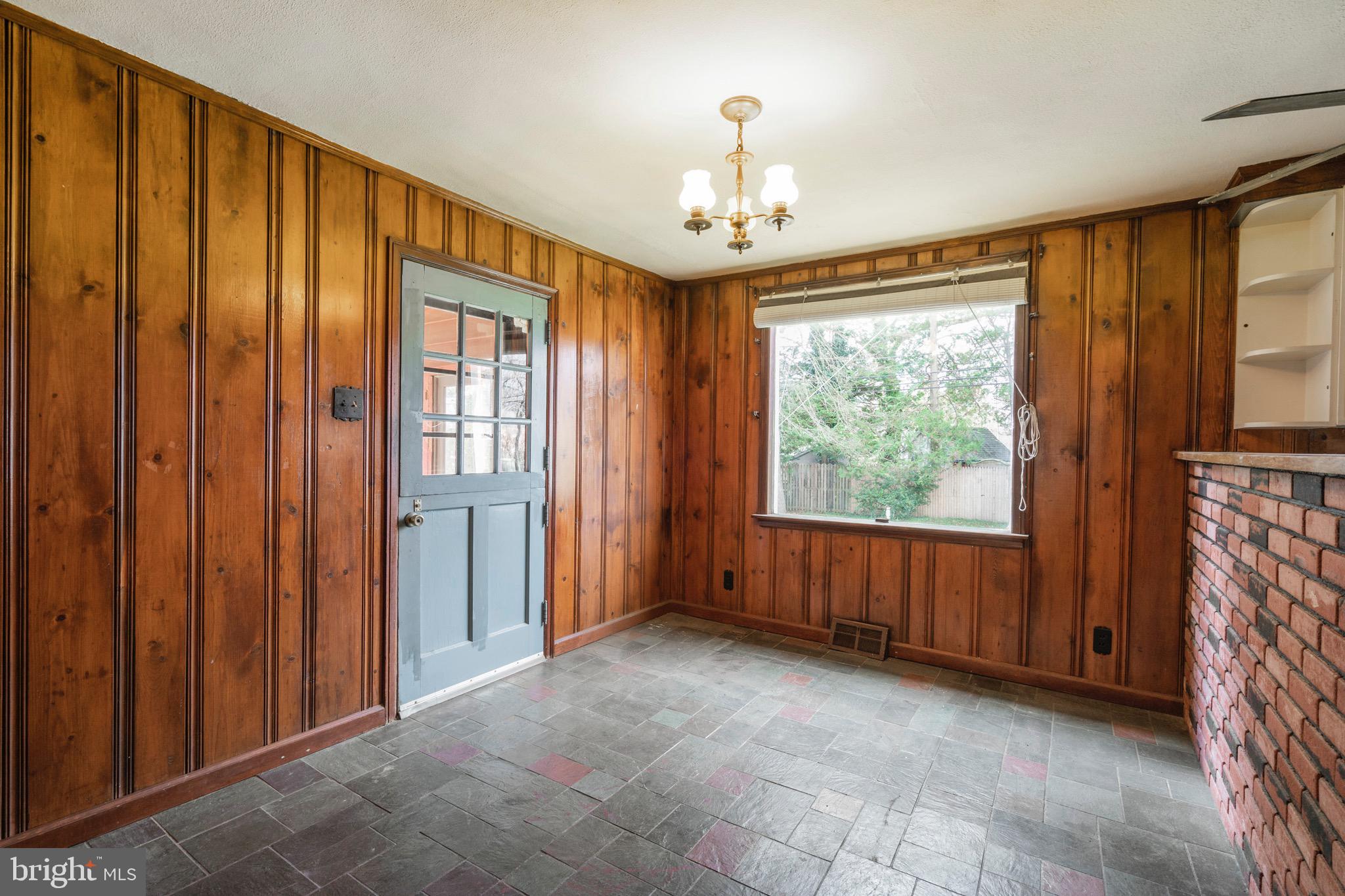 303 Willow Road Oreland, PA 19075 - Photo 11 of 27 Dutch door to side screened-in porch