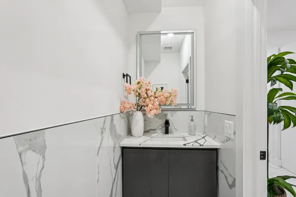 a view of a hallway with washer and dryer