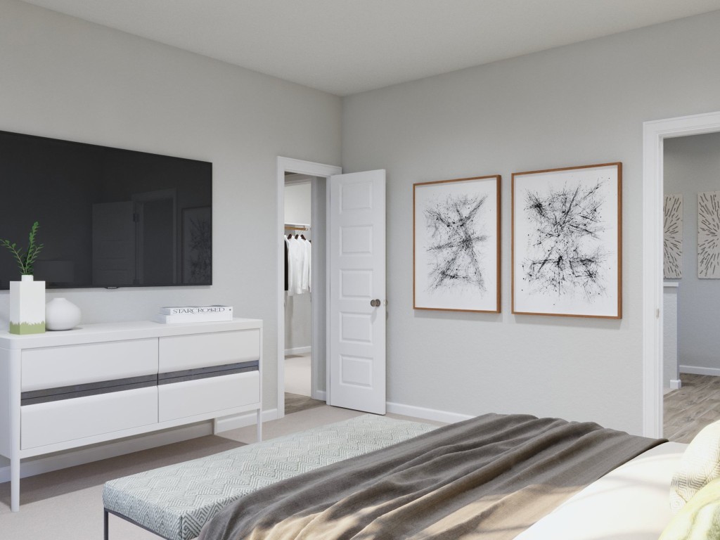 2312 Pipefish Drive Conroe, TX 77384 - Photo 23 of 33 a bedroom with a bed and a painting on the wall