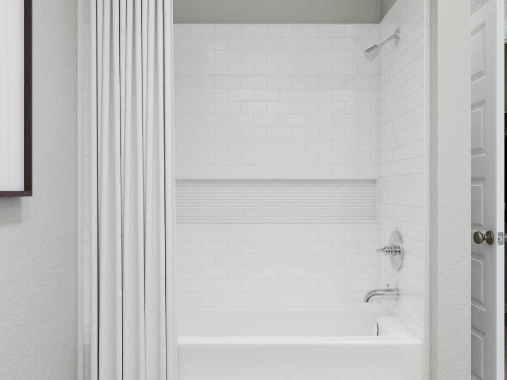 2312 Pipefish Drive Conroe, TX 77384 - Photo 25 of 33 a bathroom with a bathtub