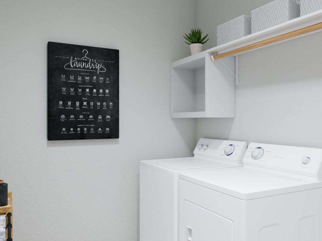 2312 Pipefish Drive Conroe, TX 77384 - Photo 27 of 33 a utility room with dryer and washer